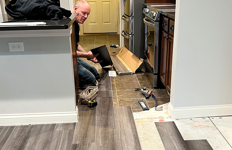 Installation of new vinyl plank flooring