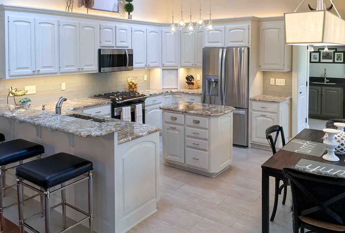 Large oak kitchen in Powell, Ohio painted white by Classic Cupboards Paint Studio