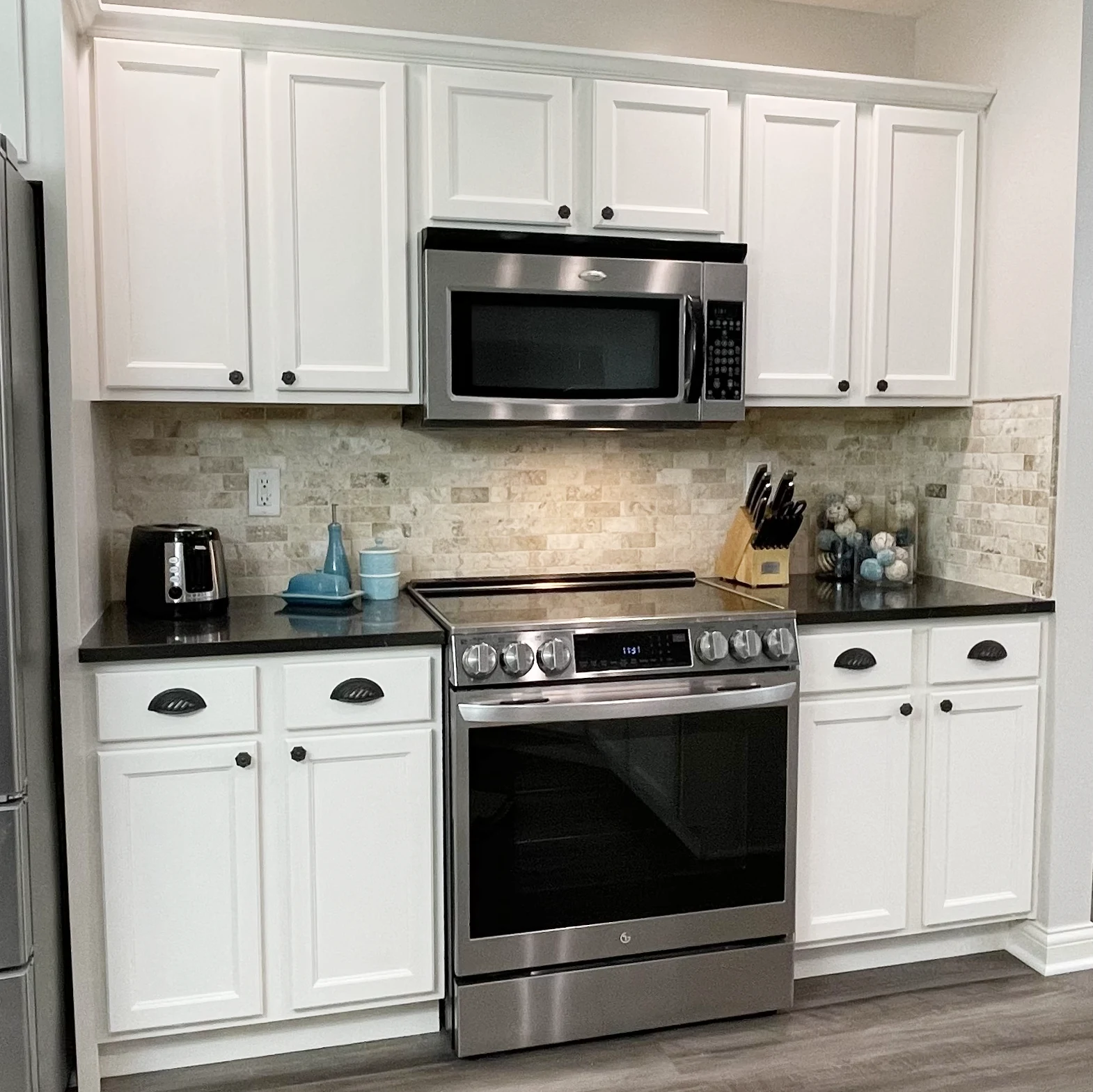 Maple cabinets painted white