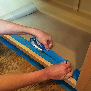 Masking inside a kitchen cabinet for painting
