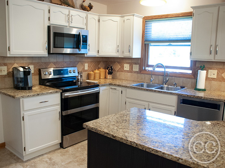 Kitchen painted with Classic Cupboards Paint. Visit www.classiccupboardspaint.com for more details.