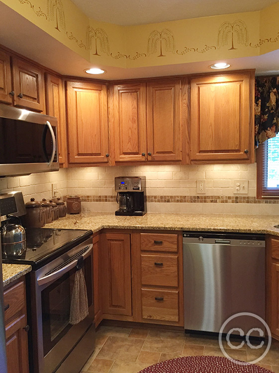 Kitchen painted with Classic Cupboards Paint. Visit www.classiccupboardspaint.com for more details.