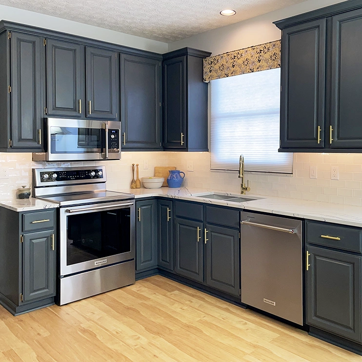 Oak kitchen in Hilliard, OH painted Vintage Blue with black wax