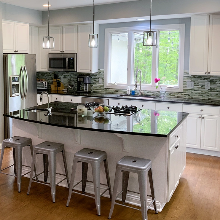 Oak kitchen in Westerville, OH painted Vintage Blue with black wax