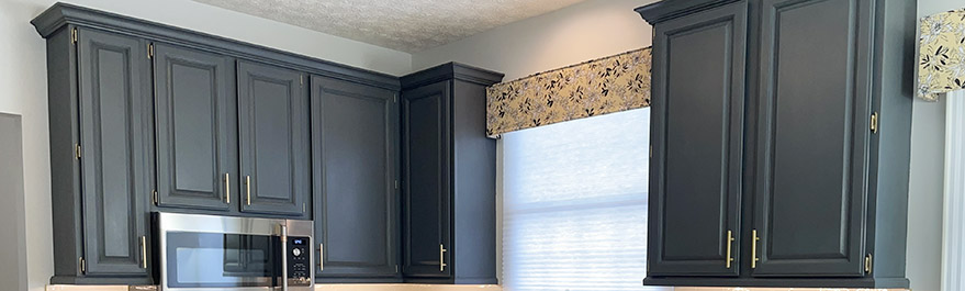 Upper cabinets painted with Classic Cupboards vintage blue paint
